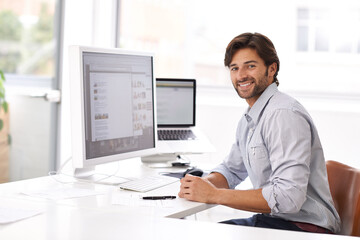 Obraz premium Business man, job portrait and computer coding of a IT professional at a office desk. Typing, cyber company and digital website design of a online employee with pc technology at a startup workplace