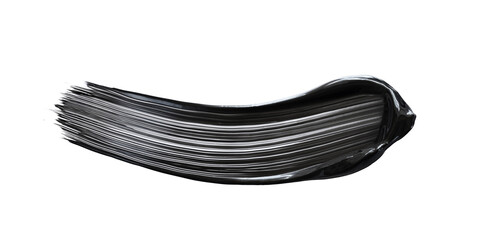 cosmetic smear of black mascara on white background