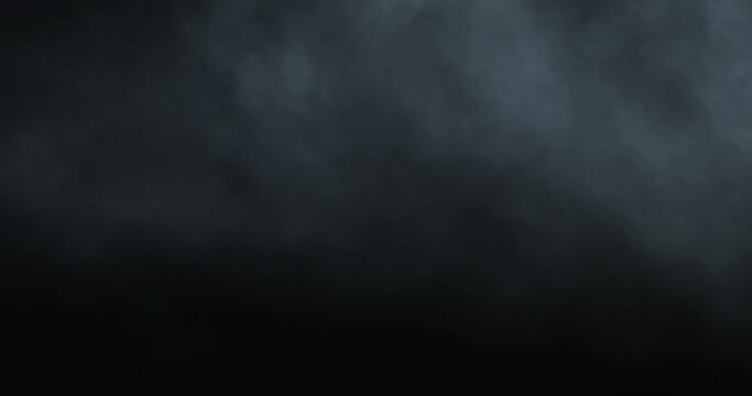 Smoke releasing on a black background, perfect for background