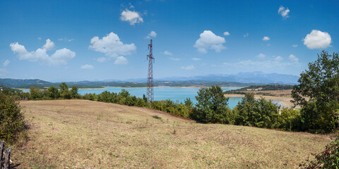 Fototapeta premium Summer Ulza Lake view from mountain road in Diber County, Balkan mountains, Albania, Europe.