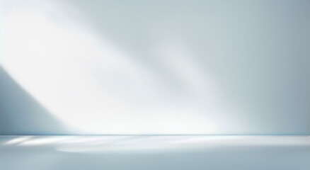 Minimal abstract light blue background for product presentation. Shadow and light from windows on...