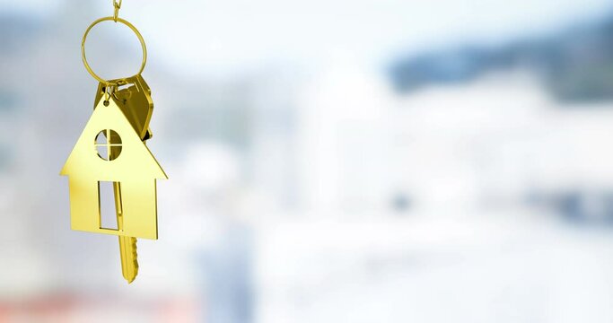 Animation of golden house keys against blurred view of tall buildings