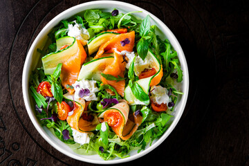 smoked salmon salad with cucumbers, cream cheese, arugula