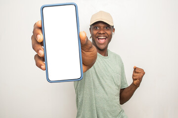 young black man excitedly showing his large phone screen