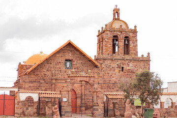 View of the church of the Tiwanaku (Tiahuanaco) people, next to the pre-Columbian archaeological site of Tiwanaku, one of the largest in South America.