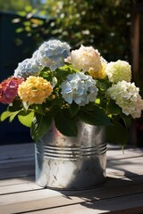 Fototapeta premium Colourful hydrangeas in metal planter in sunny garden, created using generative ai technology