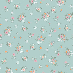 Fototapeta na wymiar Fashionable pattern with small flowers on a light green background. Seamless botanical print with various floral elements. A collection of vintage textiles for fabrics and wallpapers.