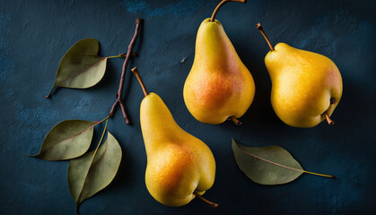 pears on a wooden background, close up photo of some yellow pears 