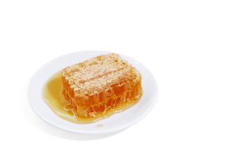 beeswax honeycomb yellow natural honey slices on white plate isolated PNG transparent