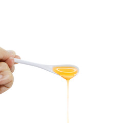 Honey flows from a white ceramic spoon. natural food sweet desert honey transparent food light sweet syrup delicious food  PNG transparent