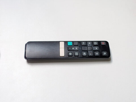 A digital tv remote control on white background, with no brand and no logo