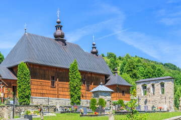 The wooden otrhodox church of St. Michael the Archangel (today a Roman Catholic church) in...