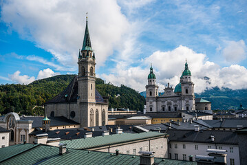 Obraz premium Beautiful of Aerial panoramic view in a Summer season at a historic city of Salzburg with Salzach river in beautiful light sky, Salzburger Land, Austria