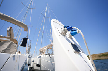 Electrical power outlet on a ship harbour bay. Photo with the electricity outlets used for parked ships and yachts at the sea side marina.