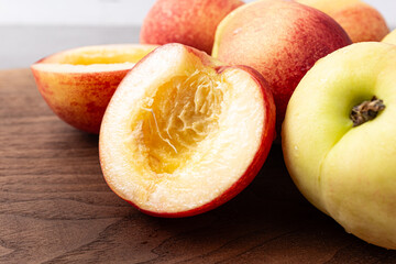 Small, sweet, hairless white peaches