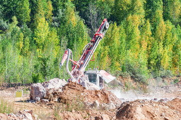 Special Stone Drilling Machine Working at the Top of a Stone Quarry
