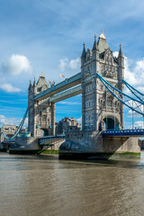 Fototapeta na wymiar The Tower Bridge and the river Thames on a sunny day in London, UK
