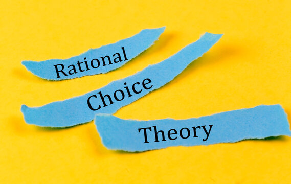 RATIONAL CHOICE THEORY text on a blue pieces of paper on yellow background, business concept