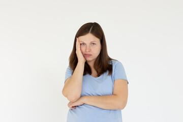 Fototapeta premium doubt and confusion concept - portrait of confused beautiful woman expressing distrust and suspicion,studio shot on white background