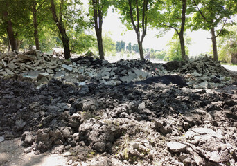 mountain of crushed concrete and stones in the park