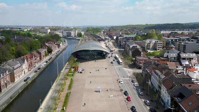 Halle, Flemish Brabant Region, Belgium, 01 05 2023, aerial top down view of the railway station and the sea canal in the city of Halle on a sunny spring day. High quality photo. High quality photo