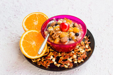 Traditional Turkish Orange Ashura Dessert, designed with sliced oranges
