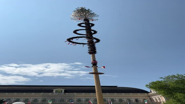 traditional maypole in front of Bad Ischl spa center