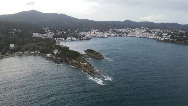 Aerial view of village of Cadaques and nature and sea along Costa Brava Catalonia Spain