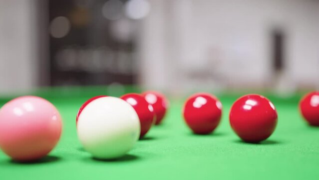 Close up of Snooker shooting on snooker table and balls in slow motion