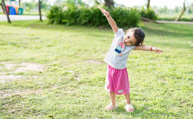 Pretty girl raising hands for her success, concept of success in life,Sstkhome.