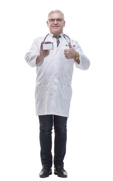 in full growth. qualified doctor showing his visiting card