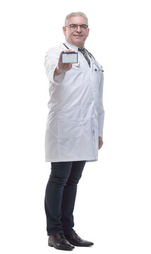 in full growth. qualified doctor showing his visiting card