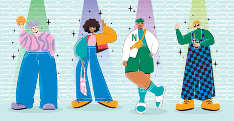 group of young people in fashionable clothes are standing together. Teenagers pose against the wall.