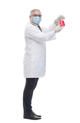 in full growth. doctor in a protective mask looking at the test results . isolated on a white backgro