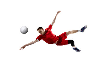 Motivated young man, volleyball player in motion during game, training, playing with ball against white studio background. Concept of sport, active lifestyle, health, dynamics, game, ad