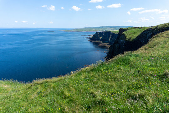 Panoramic view of Cliffs of Moher on a sunny day in Burren, Ireland