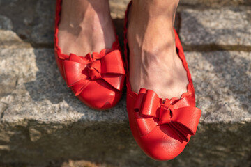 red ballerina shoes with bow