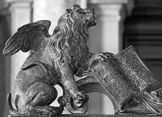 Venice - Lion bronze statue as symbol of st. Mark the Evangelist - patron of the town from gate of...