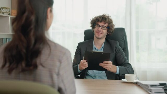 manager is doing a job interview for a new employee who applied to work in his company.
