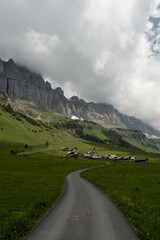 Road leading to a swiss village in mountains
