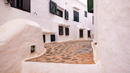 Fototapeta premium View of the alleys of the fishing village of Binibeca Vell, Menorca, Spain