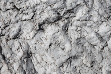 Background of cracked grey stone