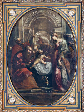 NAPLES, ITALY - APRIL 21, 2023: The painting of Circumcision of Jesus on the ceiling of Cathedral by Flaminio Allegrini (1587-1666).