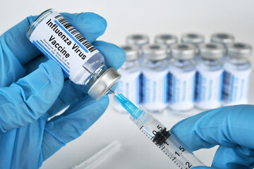 Flu shot vial with syringe