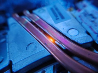The macro photography of copper bars cooler. The heat shrink tube.