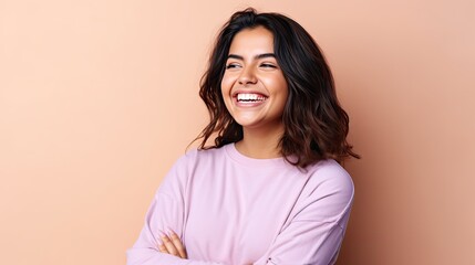 Fototapeta premium Smiling happy attractive hispanic young woman posing in studio shot