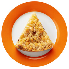 Portion piece of grated pie on a plate, delicious pastries, top view