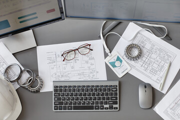 Top view background image of blueprints and plans on engineers workplace in office, copy space