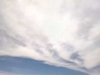 Illuminated cirrocumulus at noon