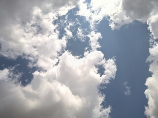 Cumulonimbus being illuminated at noon